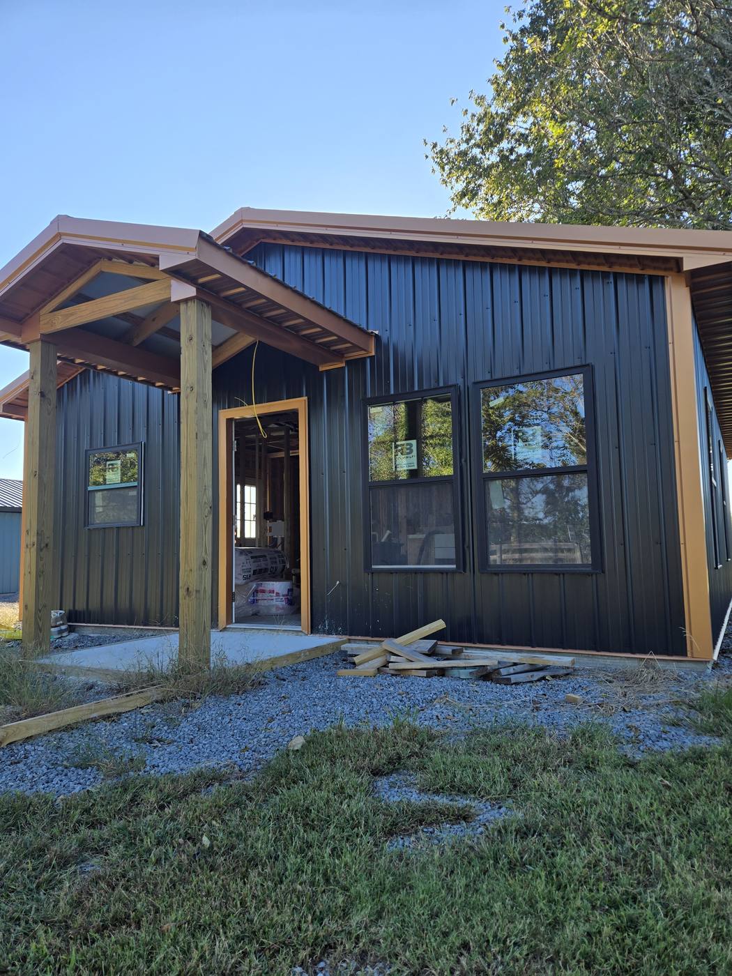 Tiny house with covered porch, front view